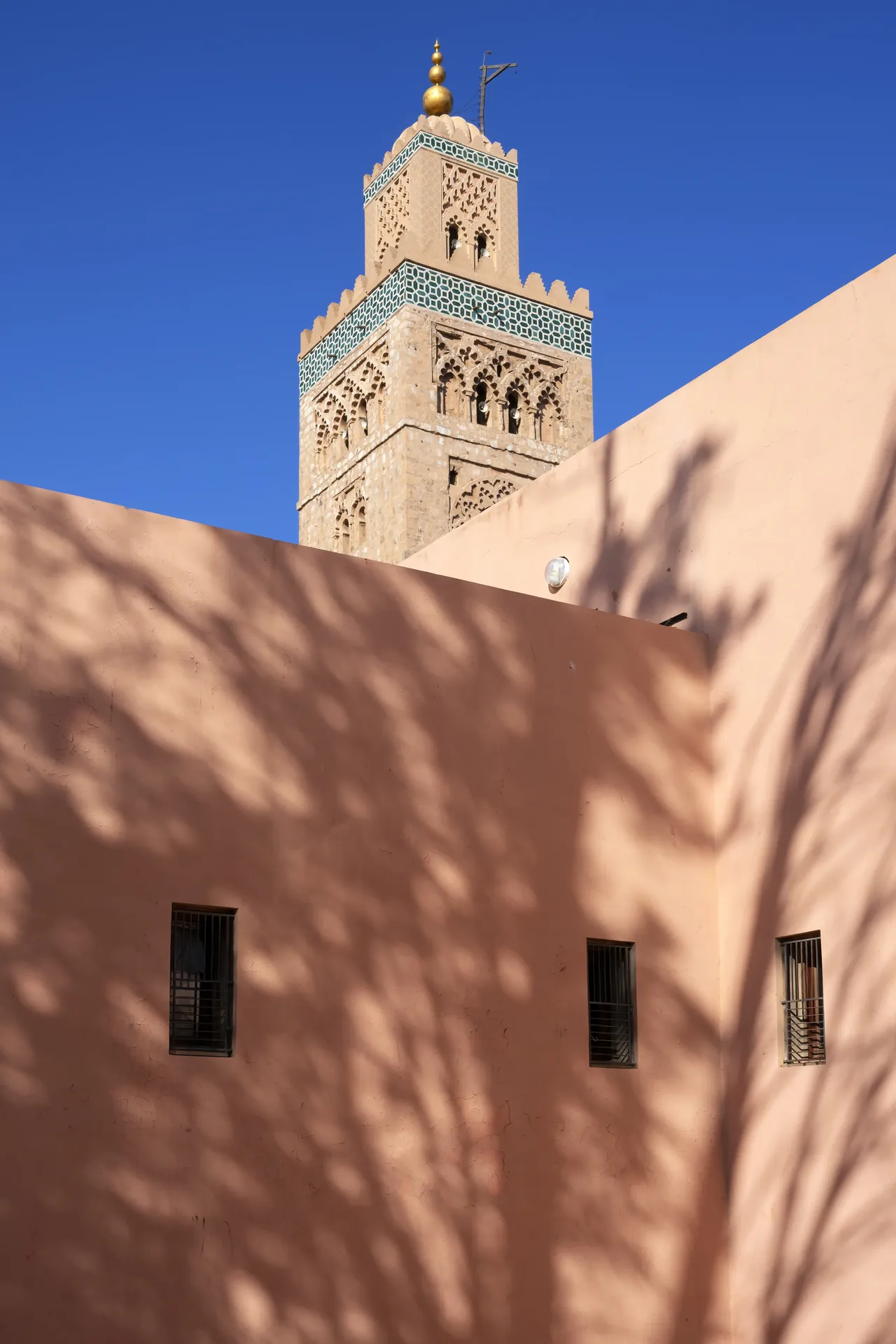 View of the Koutoubia Mosque in Marrakesh under a blue sky